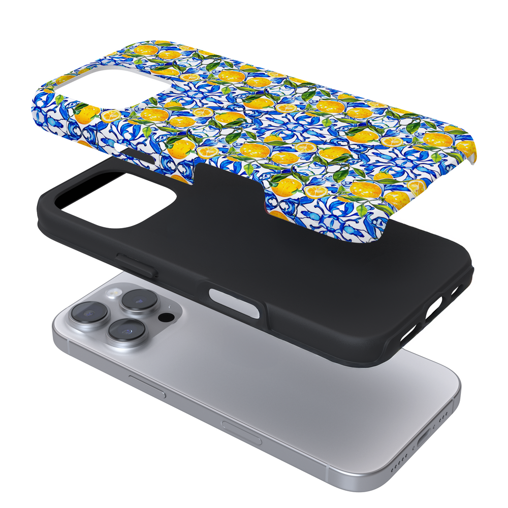 Expanded phone case with lemons and blue tiles on a white background