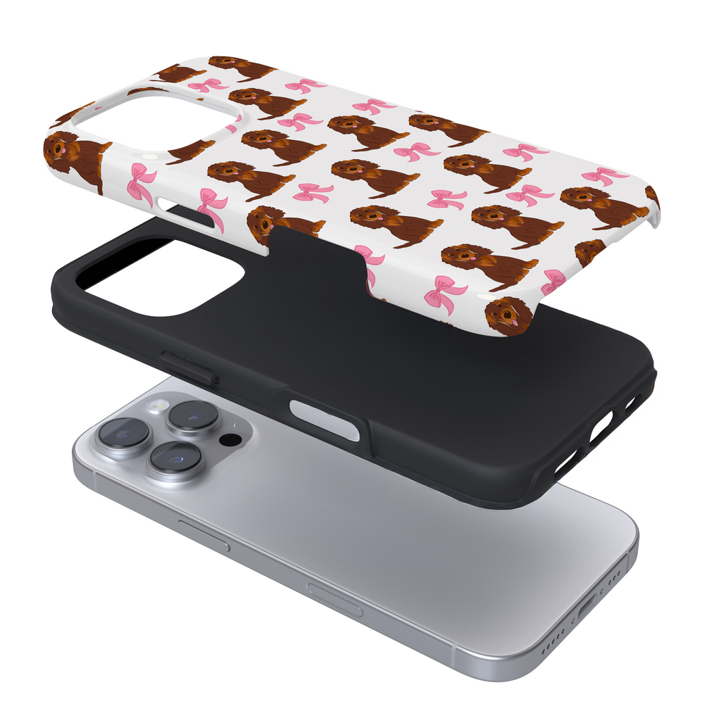 Expanded phone case with a dogs and pink bows on a white background