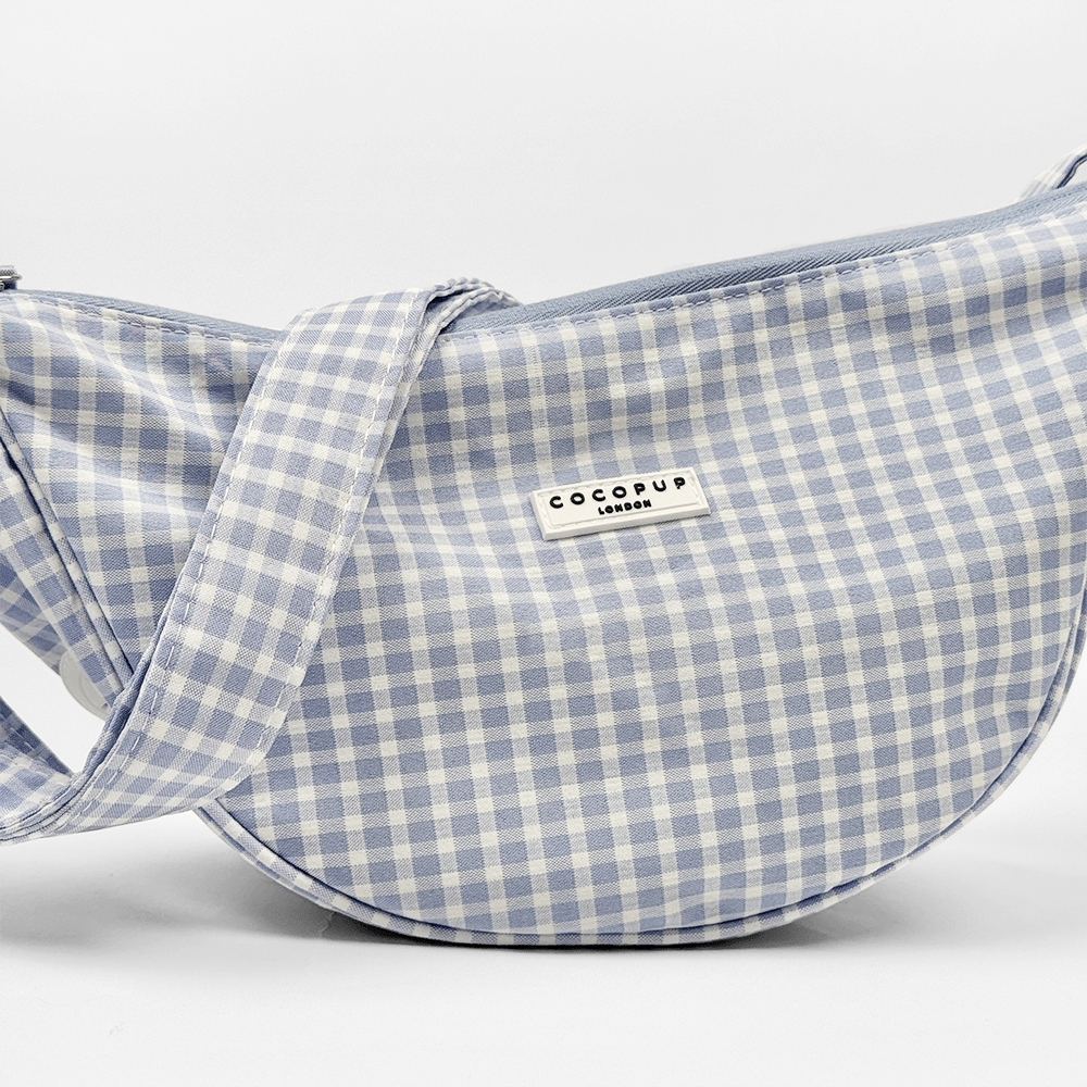 Blue and white gingham check print bag with matching strap.