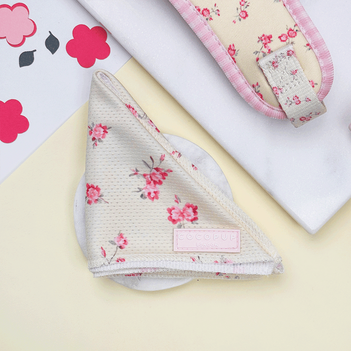 Floral Dog Bandana with yellow background and pink flowers.