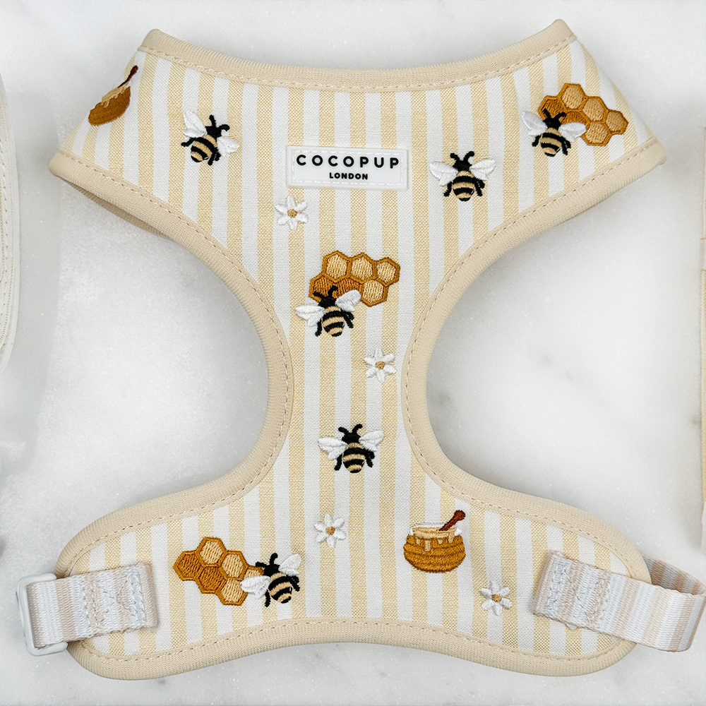 Pale yellow and white striped Dog Harness with bee and honeycomb embroidered decals. 