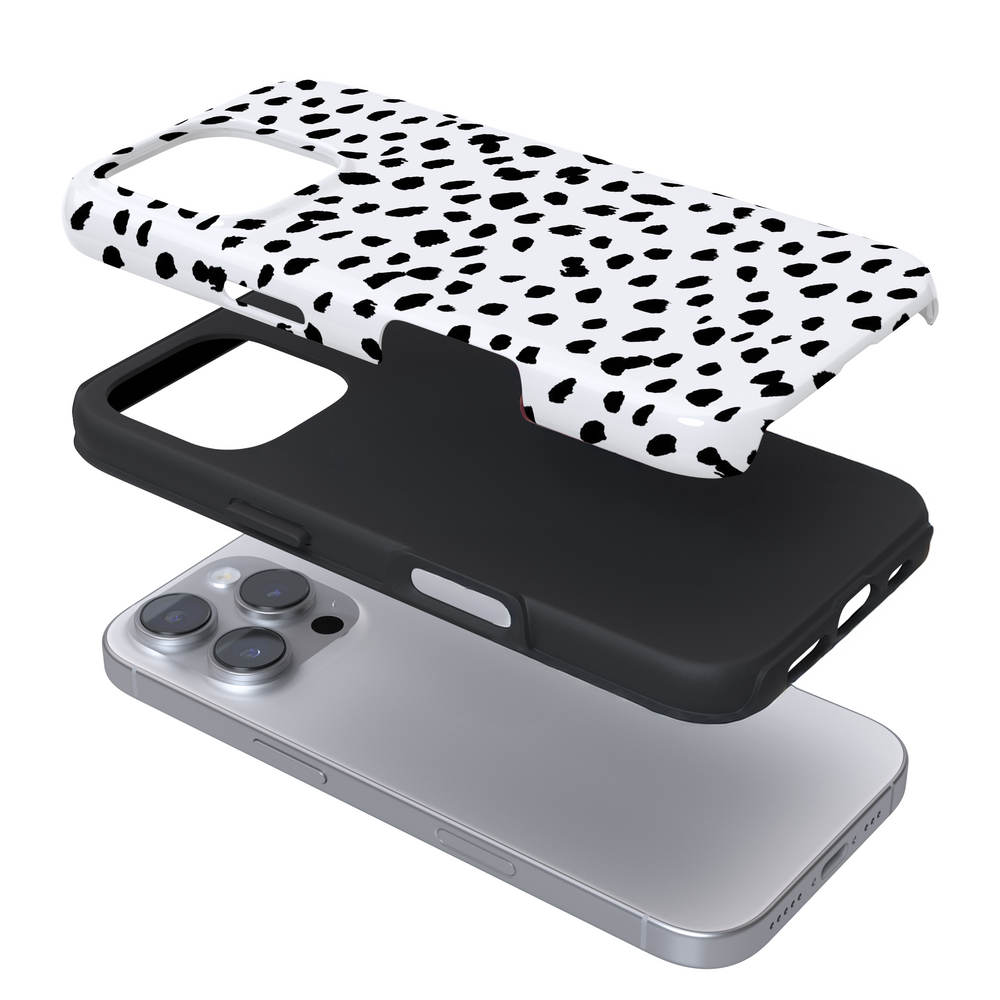 Expanded white phone case with black dots on a white background