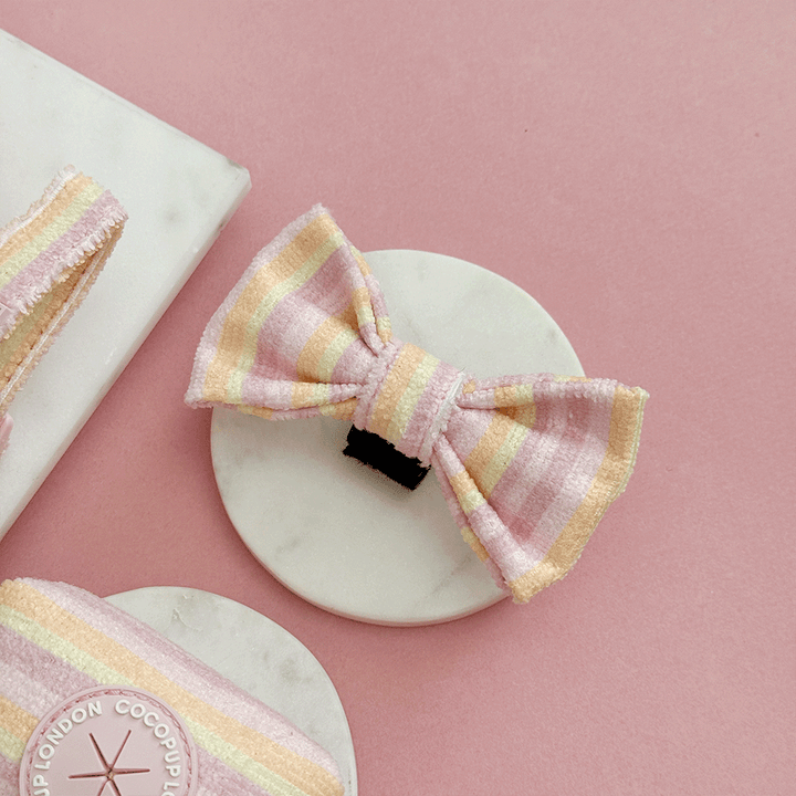 Pink, yellow and orange striped Dog Bow Tie with pink Cocopup logo badge. With velcro fastening. 