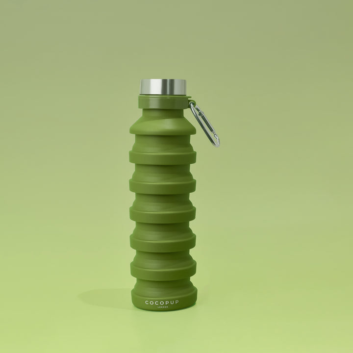 Plain Khaki Silicone Collapsible Water Bottle with Cocopup Branding, Stainless Steel Lid and Carabiner Clip.