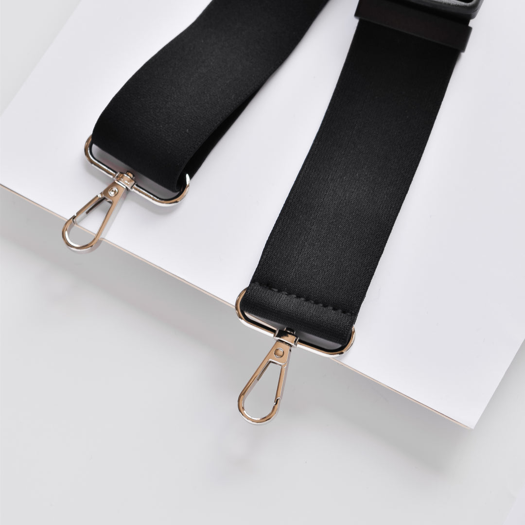 Black-waist-bag-strap-with-black-buckle-and-silver-details
